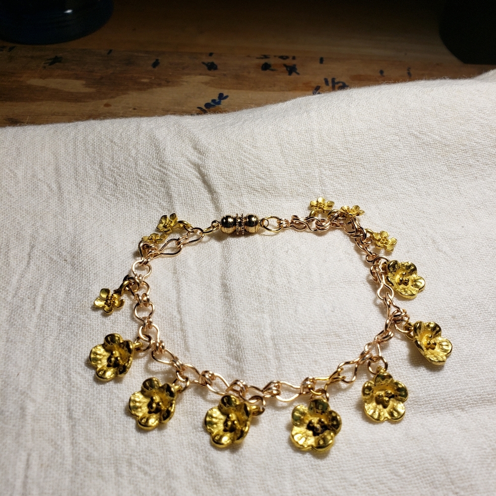 6 - 8 in gold colored flowered charm bracelet handcrafted